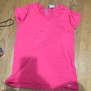 Pink drink-fit Nike shirt